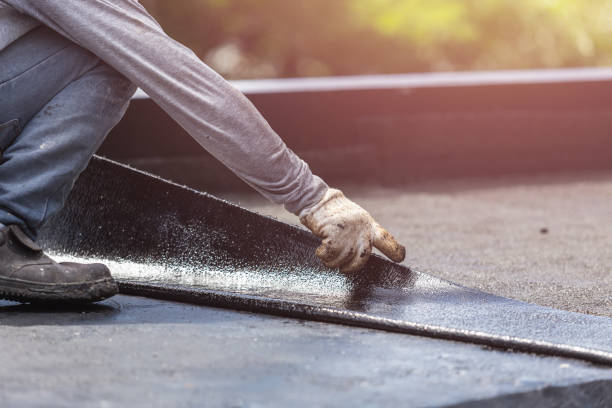 Professional Emergency Waterproofing technician working in Warrenville, IL